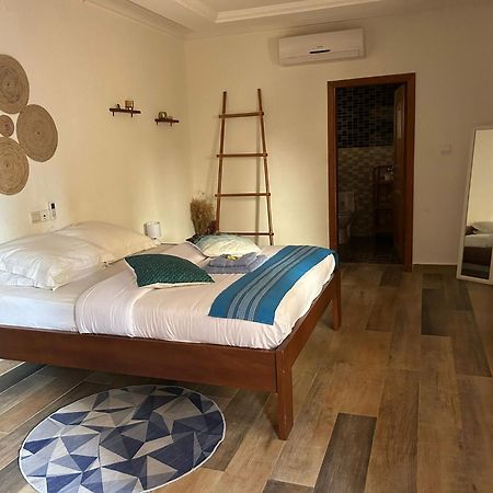L'Oasis Guesthouse Cotonou Exterior foto
