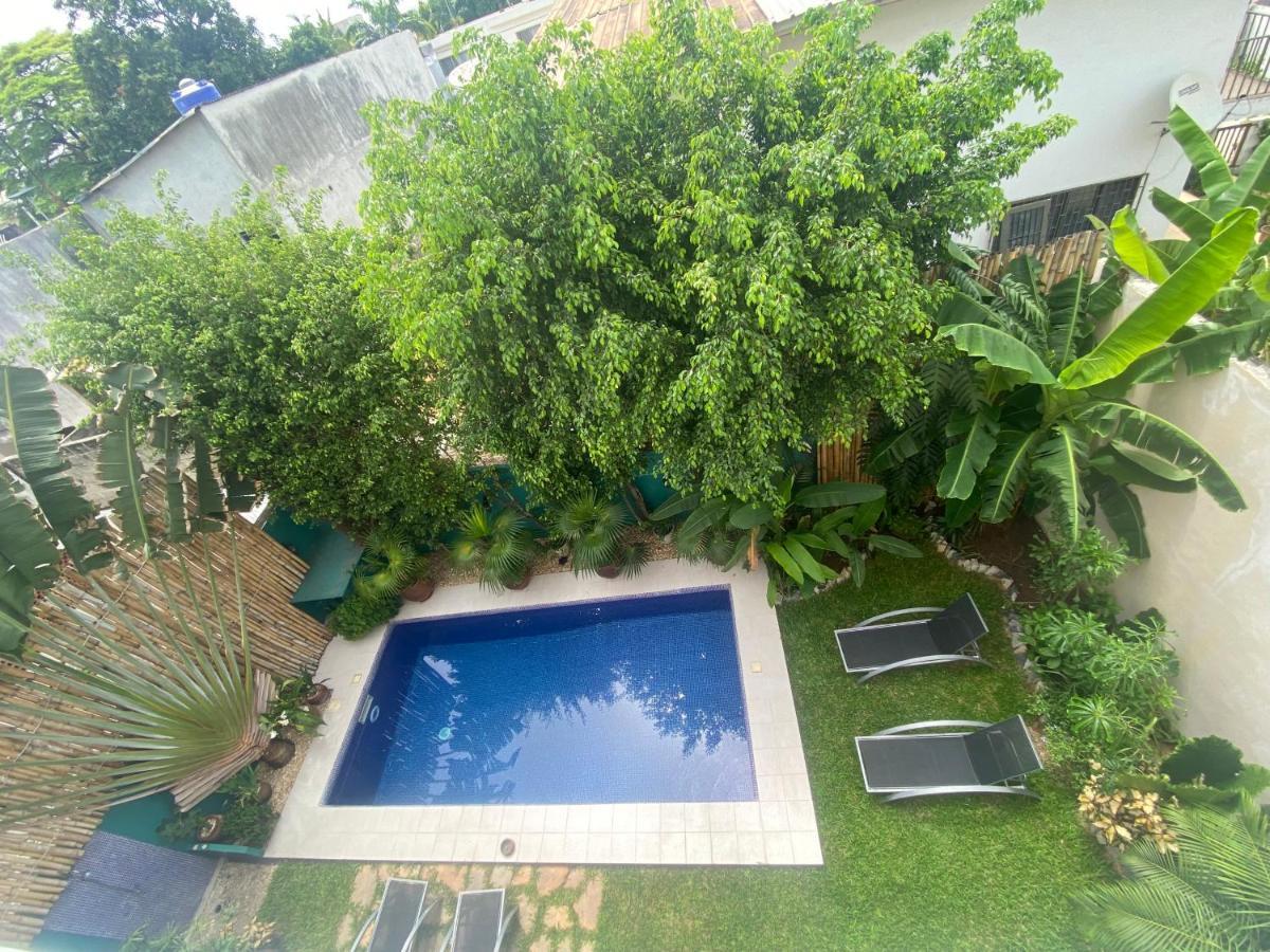 L'Oasis Guesthouse Cotonou Exterior foto