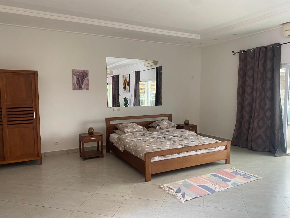 L'Oasis Guesthouse Cotonou Exterior foto