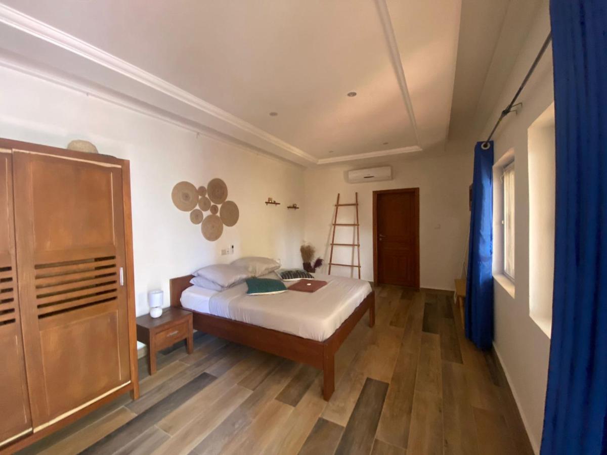 L'Oasis Guesthouse Cotonou Exterior foto