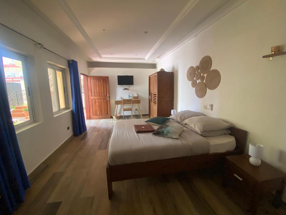 L'Oasis Guesthouse Cotonou Exterior foto