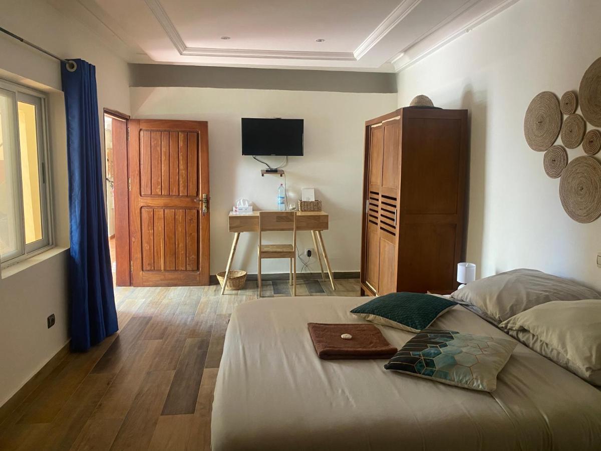 L'Oasis Guesthouse Cotonou Exterior foto