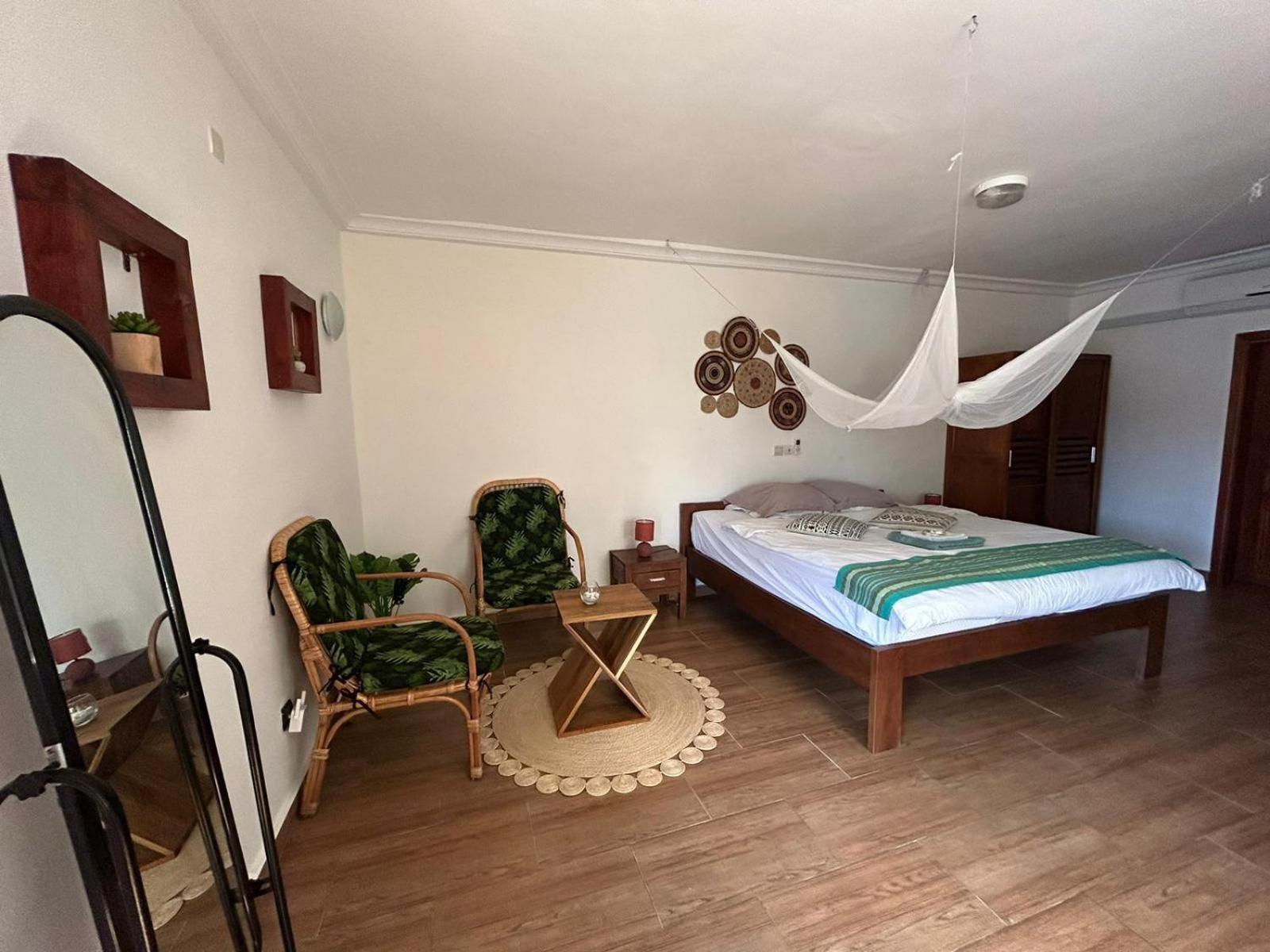 L'Oasis Guesthouse Cotonou Exterior foto