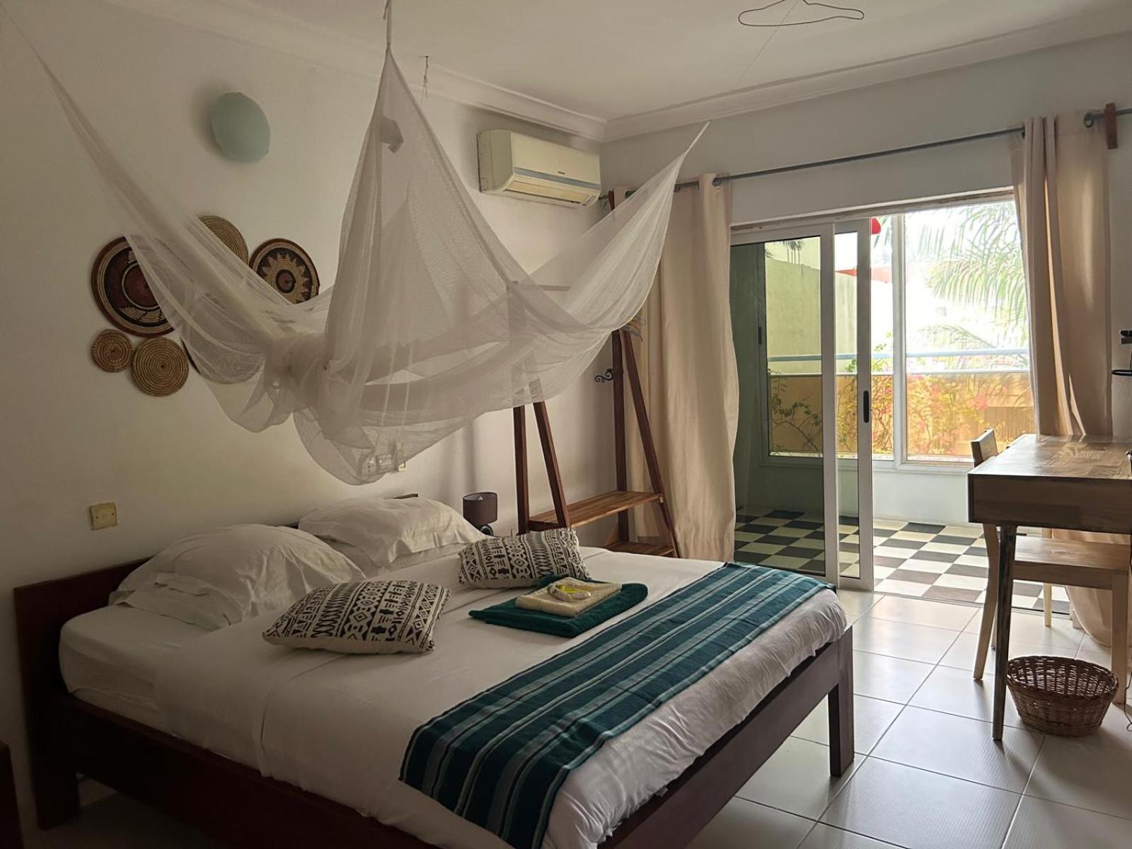 L'Oasis Guesthouse Cotonou Exterior foto
