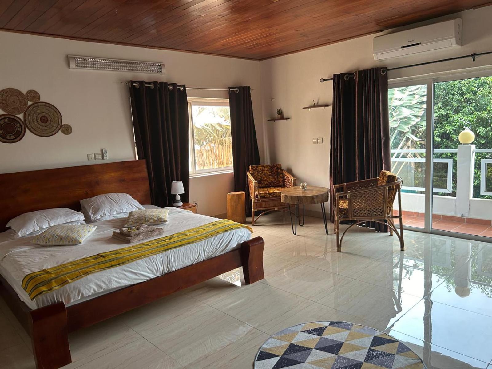 L'Oasis Guesthouse Cotonou Exterior foto