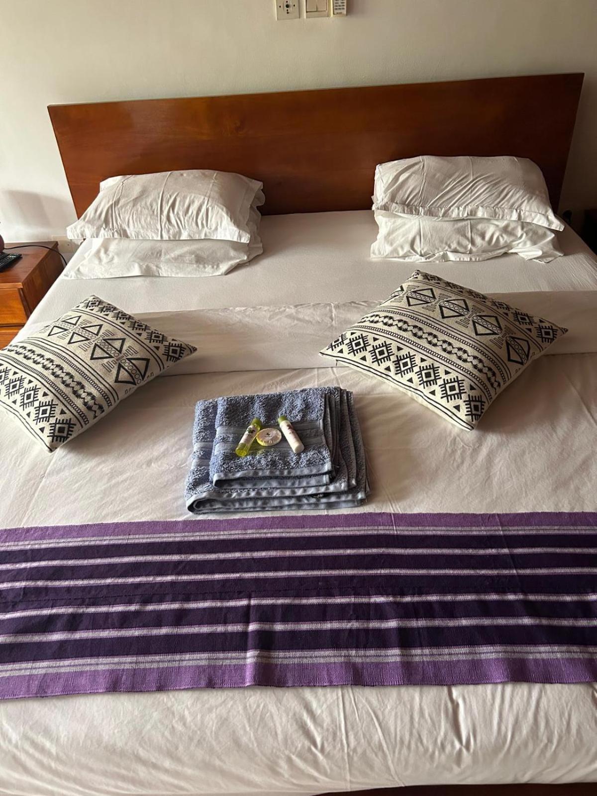 L'Oasis Guesthouse Cotonou Exterior foto