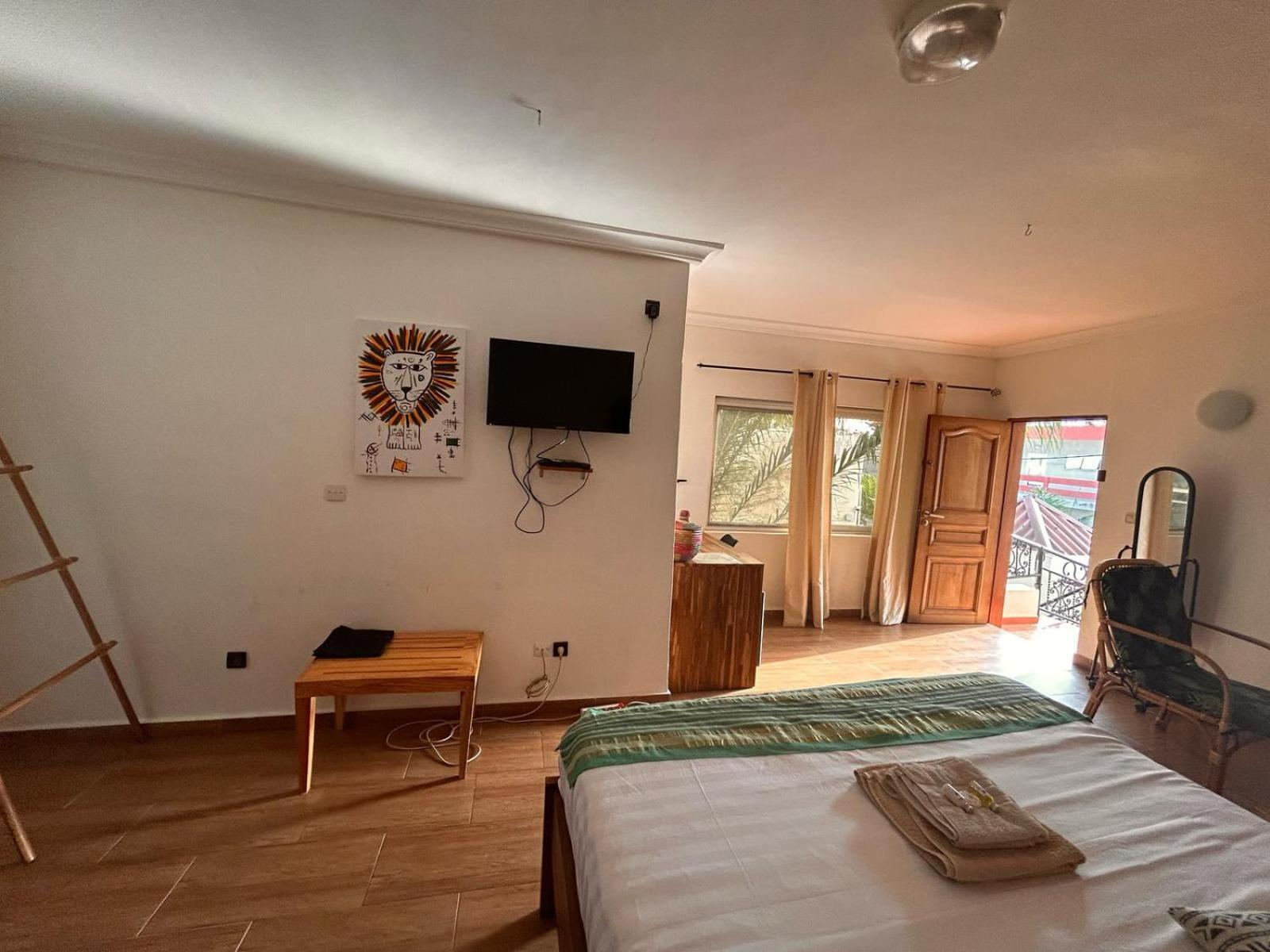 L'Oasis Guesthouse Cotonou Exterior foto